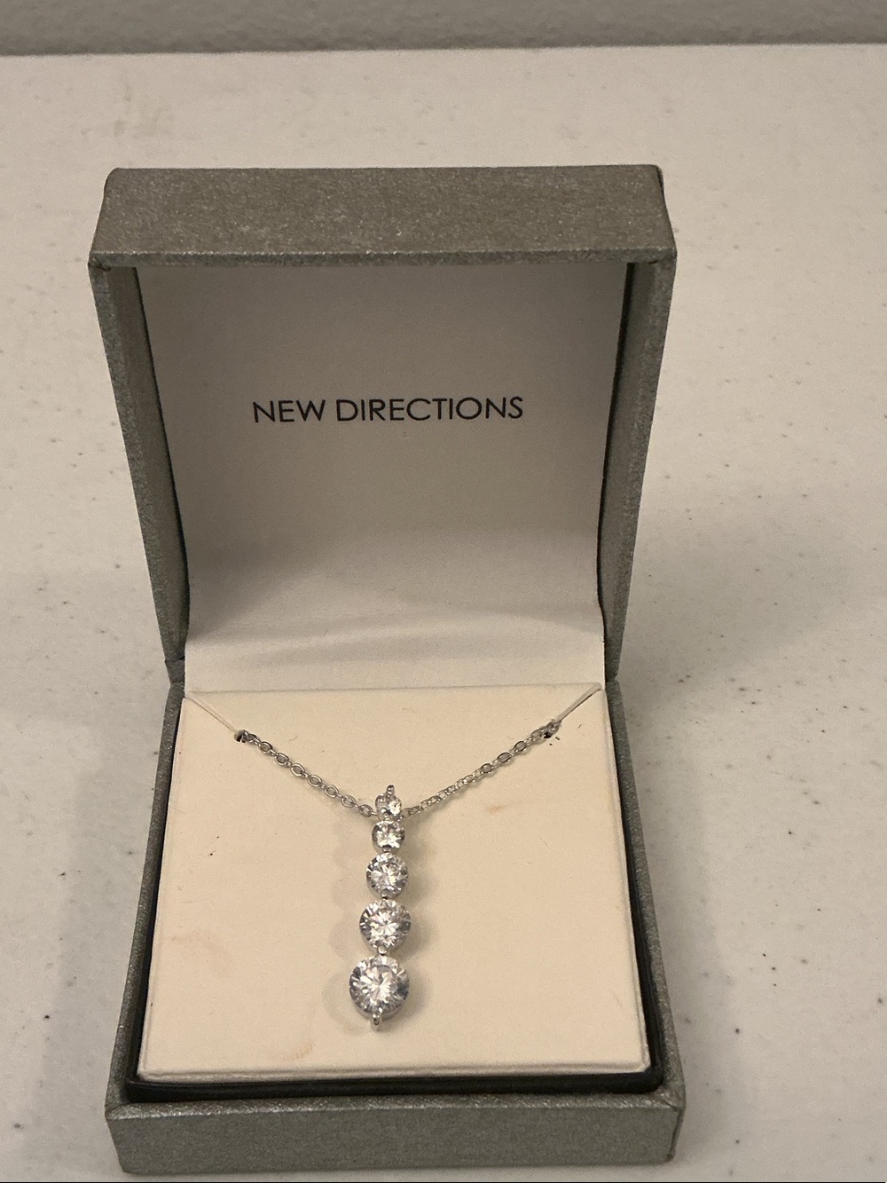 new directions Silver-Tone Graduated Crystal Drop Necklace